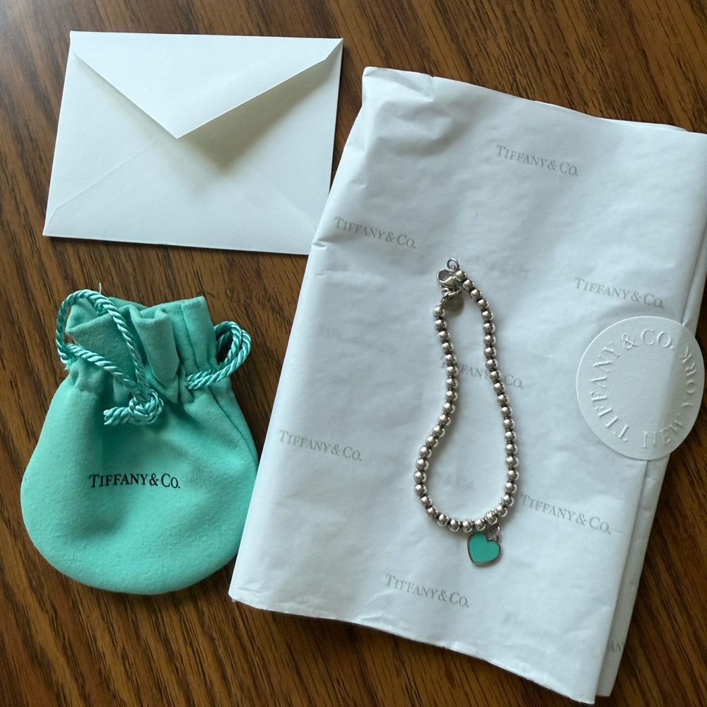 Tiffany & Co. Silver Bracelet with Blue Heart Charm